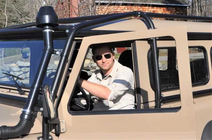 Mike Sandone in his Land Rover: He is a cave explorer described as “Monroe’s Indiana Jones.”