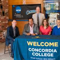 <p>Coach Brian Sondey, CACC Commissioner Dan Mara, Dr. Martin and Samia Sayegh, Athletics Director Ivan Marquez, and Concordia New York President, Rev. John Nunes, Ph.D. at the endowment agreement signing in Bronxville.</p>