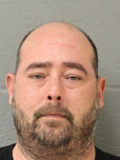 Police: Owner Set Newtown Liquor Store Ablaze, Vandalized With Swastikas
