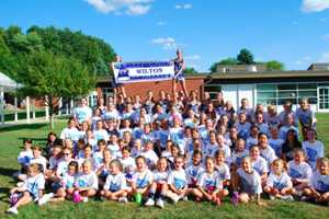 Wilton High School Cheerleaders Run Spirit Clinic For Young Fans