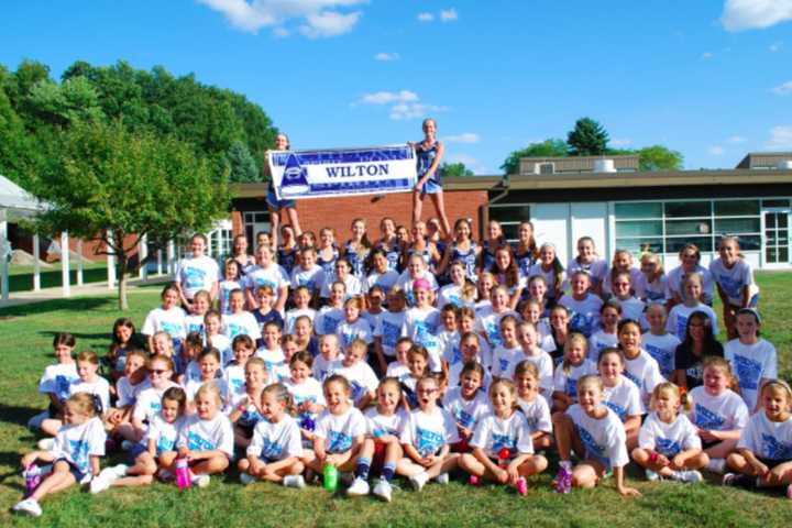 Wilton High School Cheerleaders Run Spirit Clinic For Young Fans