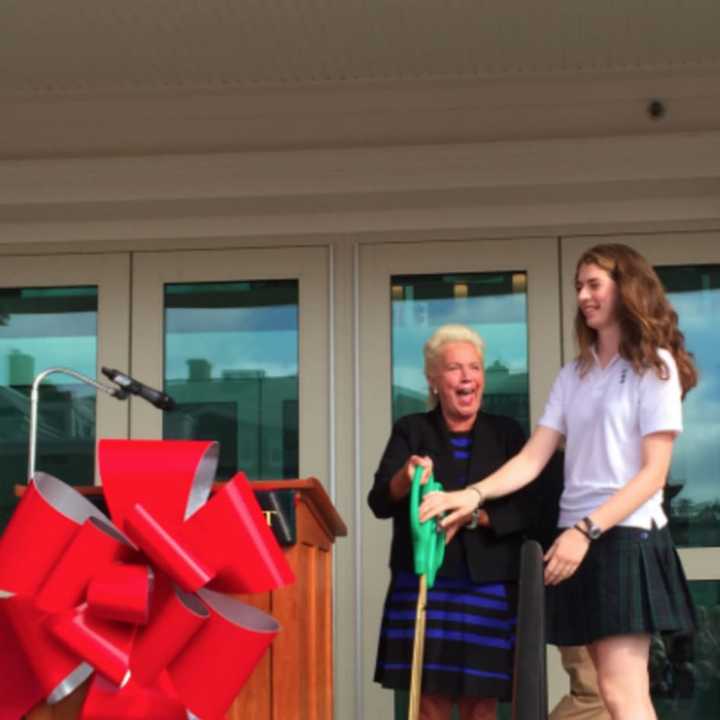 Sacred Heart Greenwich Head of School Pamela Hayes and Student Council President Grace Passannante, cut the ribbon at the official opening of the school&#x27;s new athletic center.