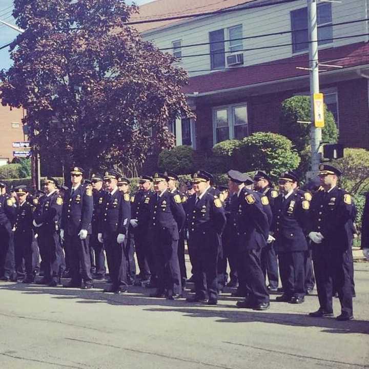 Yonkers Police line up along Yonkers Avenue for the funeral of Lt. Roy McLaughlin.