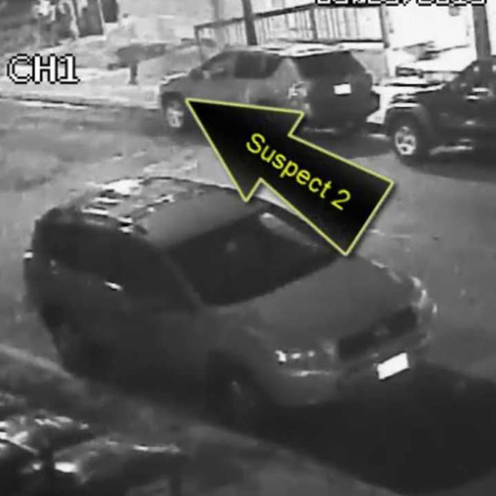 The second suspect is shown running toward the area where the victim was shot. The site is near the corner of Madison Avenue and Frank Street in Bridgeport. 