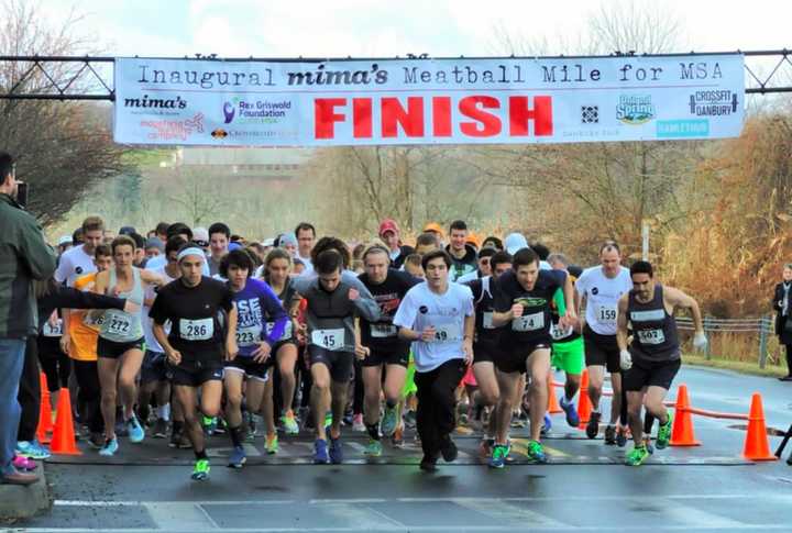 Runners break from the starting line at Sunday&#x27;s Mima&#x27;s Meatball Mile for MSA in Danbury. 