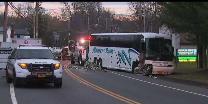 Ramapo Police said that a driver that fled from an accident scene after slamming into a tour bus has turned himself in.