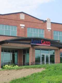 Volunteers Help Stamford's AmeriCares Assemble Emergency Kits