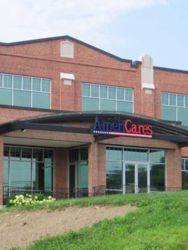 Volunteers Help Stamford's AmeriCares Assemble Emergency Kits