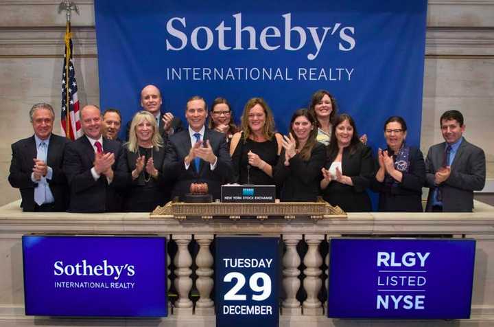 William Pitt and Julia B. Fee Sotheby’s International Realty President and CEO, Paul Breunich joined Sotheby’s International Realty Affiliates, LLC at the podium for the ringing of the closing bell Dec. 29 at the New York Stock Exchange