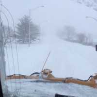 <p>A view from a plow cab on Cross County Parkway in Westchester late Saturday afternoon.</p>