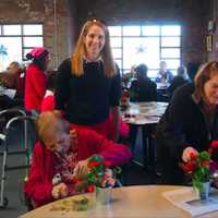 <p>Greenwich Garden Club members Libby Welch and Kathy Heidt assisting at the Greenwich Adult Daycare Center.</p>