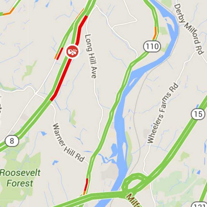 There is a nearly 3-mile backup on Route 8 in Shelton due to a one-car crash.