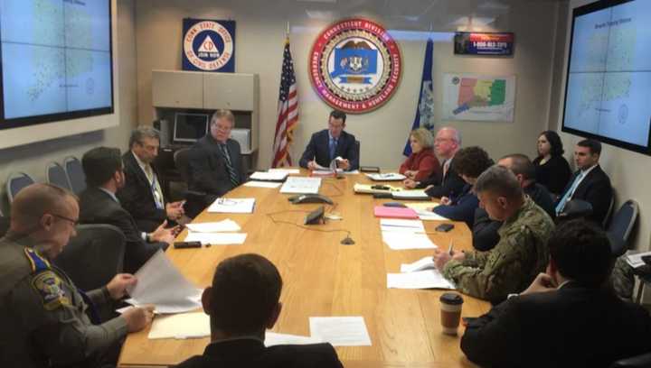 Gov. Dannel Malloy meets with members of various parts of the state government about the Zika virus on Thursday.