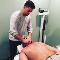 <p>DeCicco of DeCicco Acupuncture in Glen Rock practices &quot;scraping&quot; on a patient.</p>