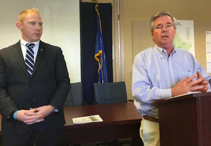 Brookfield First Selectman Steve Dunn, right, speaks Friday while state Rep. Stephen Harding, R-107th District, looks on at a press conference urging residents to attend a Housing Committee hearing Tuesday in Hartford.