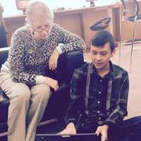 <p>NMHS students teach seniors how to use technology at New Milford Senior Center.</p>