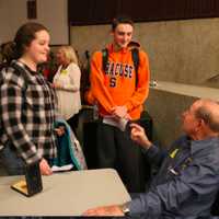 <p>91-year-old Dave Mann spoke to students about his experiences during and after the war in the auditorium at the school.</p>