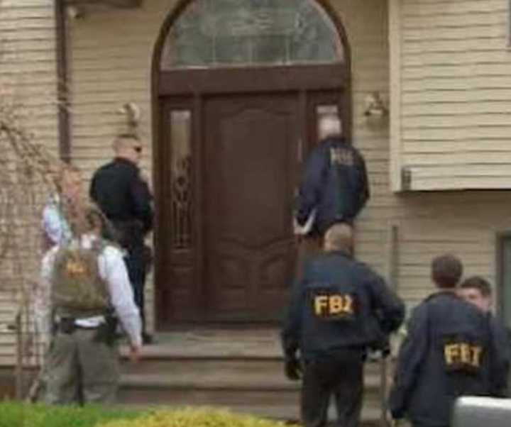 FBI agents and police in the midst of one of their series of raids Wednesday afternoon in Rockland.