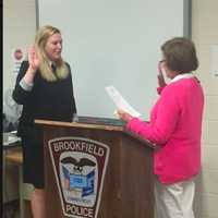 <p>Police officer Bethany Barr gets sworn into the Brookfield Police Department</p>