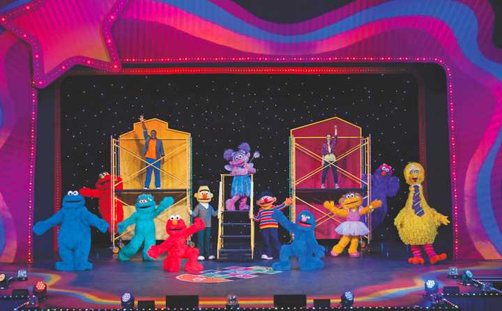 Children and adults can dance with Sesame Street characters in two shoes on Tuesday at The Palace in Stamford.