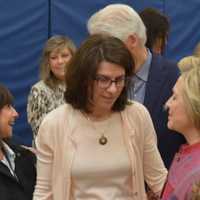 <p>Hillary Clinton speaks with Jamie Edelman, center, principal of Chappaqua&#x27;s Douglas G. Grafflin Elementary School. The building serves as Clinton&#x27;s polling place.</p>