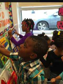 Members Of Trumbull Rotary Club Buy Books For Bridgeport Learning Center
