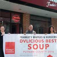 <p>This is the banner that was stolen from Frankie&#x27;s Waffles &amp; Burgers in Mahopac. Above, Carina Evangelista, far right, and Marian Feliciotto of Frankie&#x27;s with Daily Voice Director of Media Initiatives/Managing Editor Joe Lombardi in March.</p>