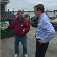 <p>Don Bell of Norm Bloom and Son explains from aspects of the oyster business to U.S. Sen. Chris Murphy during Murphy&#x27;s tour of the Norwalk business Thursday.</p>