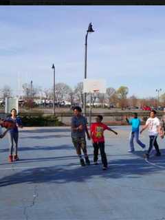 Norwalk Police Officers Shoot Hoops With Youth Program Members