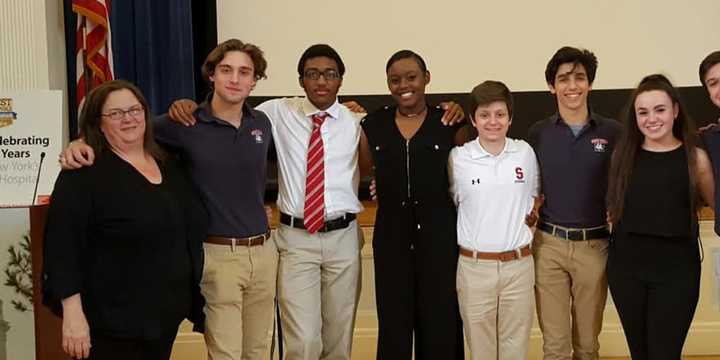 L to R: Drama Club Music Director Chloe Sasson, Nick Tabio, Dominique Burke, Sarafina Morency, Peter Astriab, Marc DeSanctis, Gabbie Sansone, Anthony Pietroluongo and Drama Club Director Frank Portanova at their abridge performance of Sister Act.