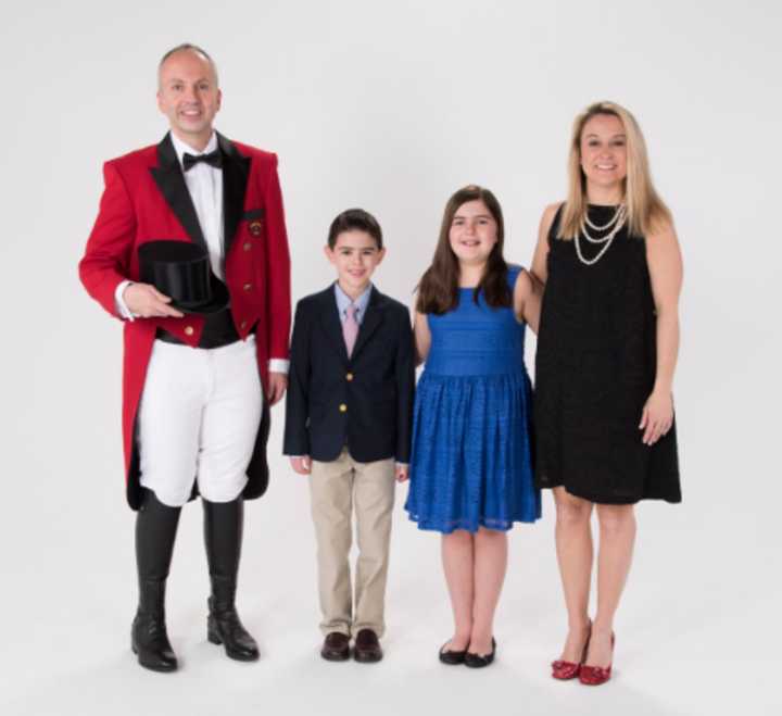 Jason Julian, left, will be the Ringmaster for this year&#x27;s Barnum Festival. With him are wife, Tammy, and children Madison and Logan.