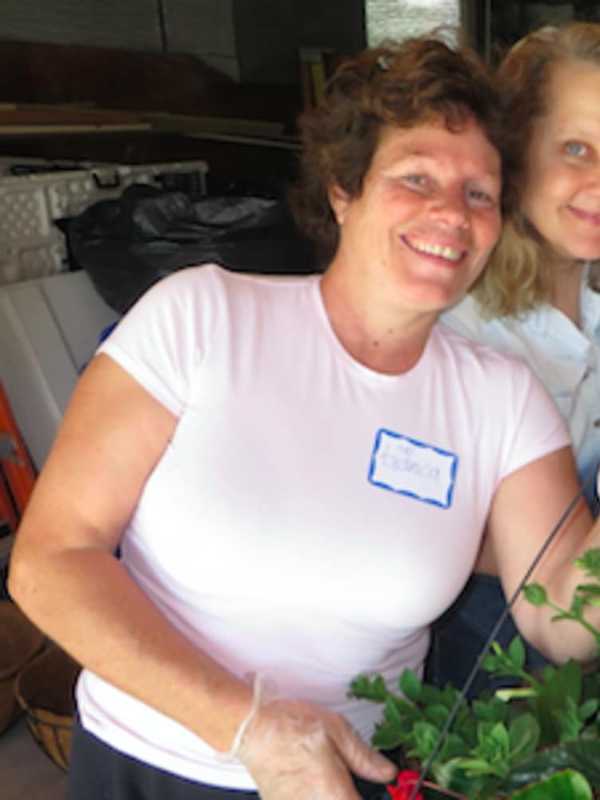 Beautification League Installs Hanging Baskets Around Downtown New Canaan