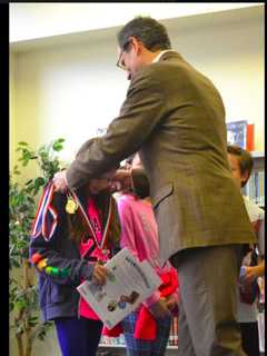 Greenwich United Way Presents Books, Medals To Students At Reading Ceremony