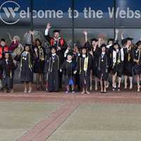 <p>Graduates of Western Connecticut State University celebrate receiving their diplomas on Sunday, May 22.</p>