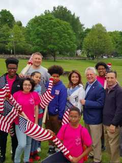 Norwalk Youth Group, Police Place Flags On Graves Following Ceremony