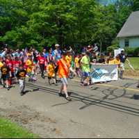 <p>Many groups and clubs in Redding march in the town&#x27;s Memorial Day parade.</p>