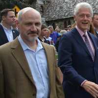 <p>New Castle Supervisor Rob Greenstein (left), marches with former President Bill Clinton in the town of New Castle&#x27;s annual Memorial Day parade, which went through downtown Chappaqua.</p>