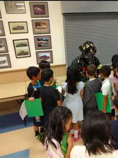 Students From Japanese School Of Greenwich Take Firehouse Tour