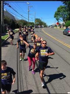 Norwalk Police Participate In Torch Run With CT Special Olympians