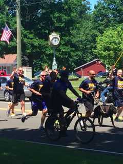 Trumbull Police Participate In Torch Run With CT Special Olympics