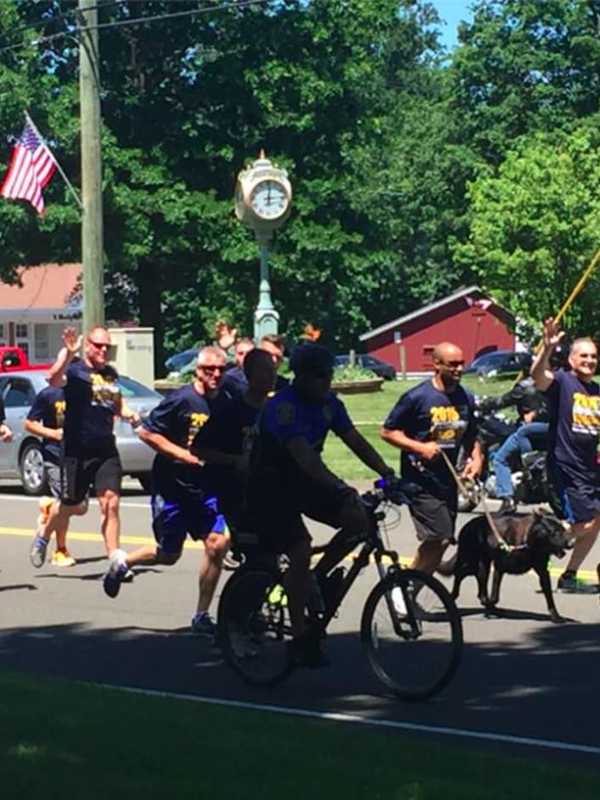 Trumbull Police Participate In Torch Run With CT Special Olympics