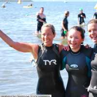 <p>Swimmers celebrate after Saturday&#x27;s Swim Across The Sound Greenwich-Stamford.</p>