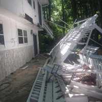 <p>The deck that collapsed during a Fourth of July celebration at 15 Silver Lane in Chestnut Ridge.</p>