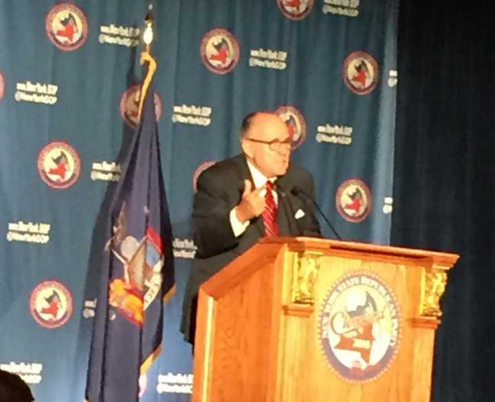 Former New York City Mayor Rudolph Giuliani addresses the New York delegation on Thursday morning at the GOP Convention in Cleveland.