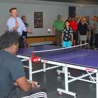 <p>U.S. Sen. Chris Murphy plays a little ping pong with Alyssa Thomas at the Smilow-Burroughs Clubhouse in Bridgeport.</p>