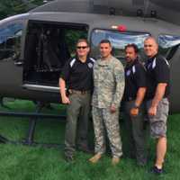 <p>Paramus Police Chief Kenneth Ehrenberg, Officer Matt Lombardo, Deputy Chief Rob Guidetti and Mayor Rich LaBarbiera.</p>