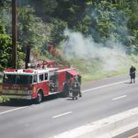 <p>The GRFD extinguishes a brush fire Sunday.</p>