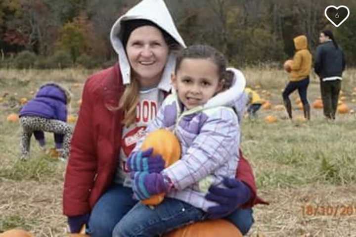 Maribella, 5, with her grandmother.