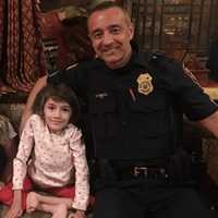 <p>Farida and a Paterson Police Sergeant.</p>