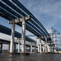 <p>Work continues on the new Tappan Zee Bridge. The final steel girder assembly on the east part of the span has been completed; the girders on the western part are next.</p>